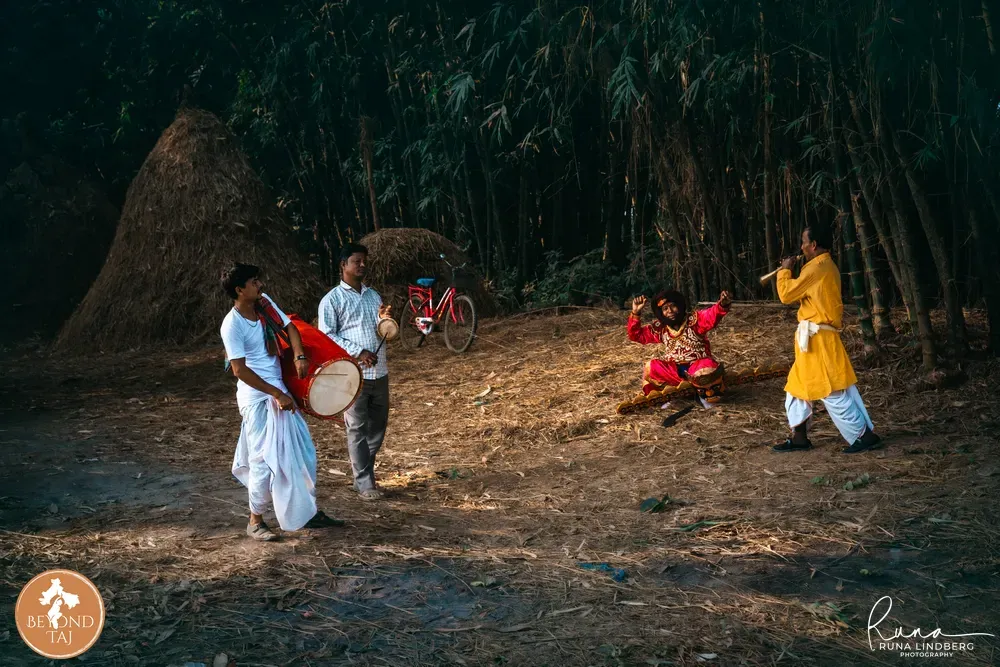 Gomira musicians playing the dhak drum, flute and cymbals that drive the mask dance, West Bengal