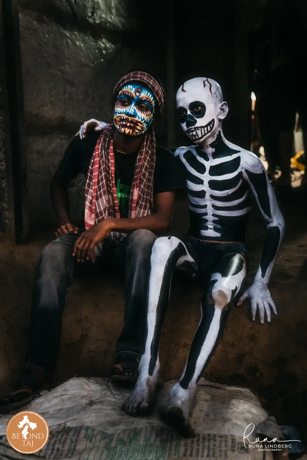 Skeleton and demon, nose to nose, between takes